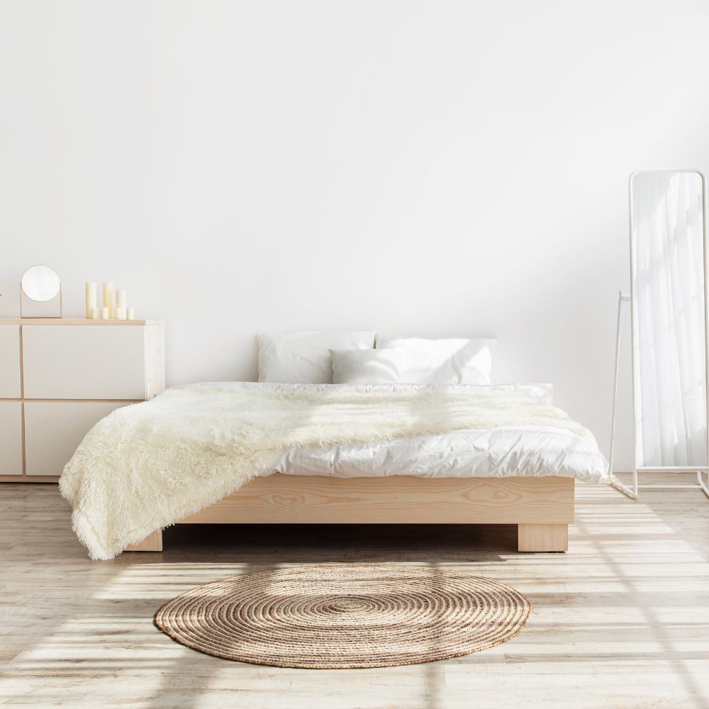 "Serene bedroom setup with soft Egyptian cotton bedding, natural light, and calming decor for stress-free sleep."